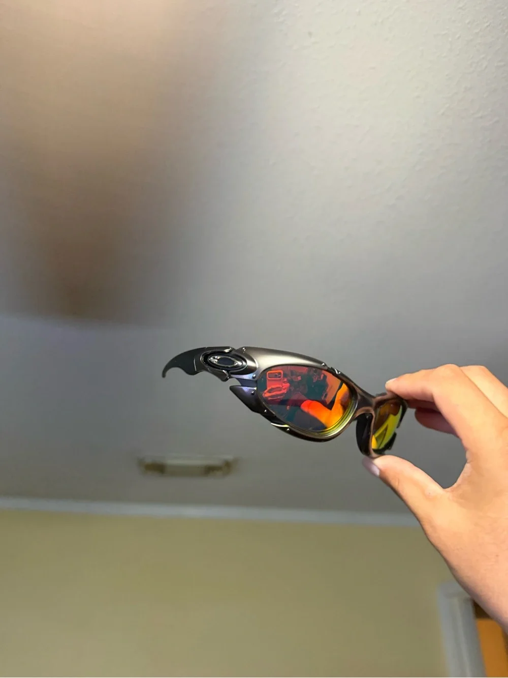 Oakley Men’s Black Frame Sunglasses with Red and Yellow Mirrored Lenses